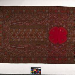 Finely woven red twill tapestry shawl with paisley design in red, orange, black, white and blue.