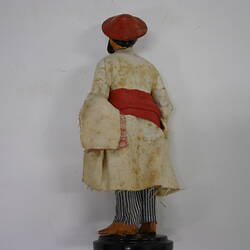 Indian Figure - Man Wearing White Tunic & Red Hat, Clay