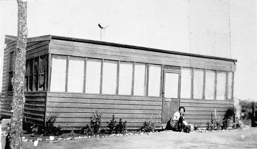 [Mrs Martin outside her third home on the soldier settlement block number 332, Redcliffs, 1920s.]