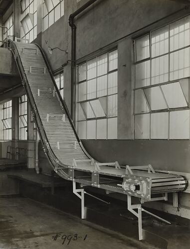 Room with steep conveyor belt.