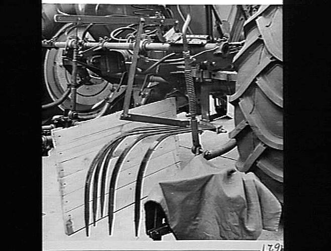 HYDRAULIC 282 CULT W/- WEEDER ATTACHMENT MOUNTED AT REAR: MAY 1954