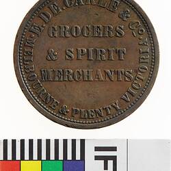 Token - 1 Penny, E. De Carle & Co, Grocers & Spirit Merchants, Melbourne & Plenty, Victoria, Australia, circa 1853