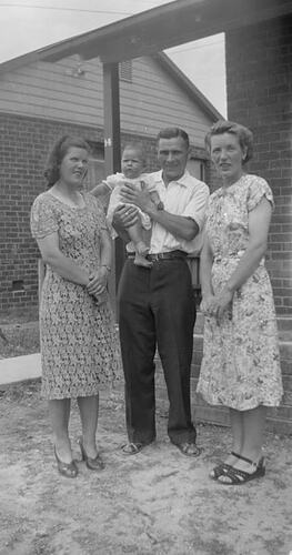 Digital Photograph - Two Women, Man & Baby Outside New Housing Commission House, Heidelberg West, 1950