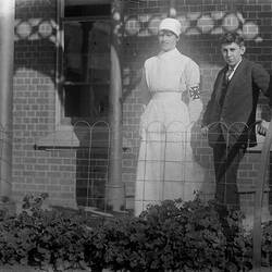 Digital Photograph - Woman in Nurse's Uniform & Boy on Verandah of the Alfred Hospital, Melbourne, 1918-1919