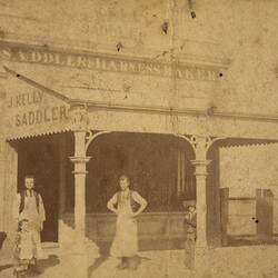 Digital Photograph - Owner, Staff & Dog outside J Kelly Saddlers & Harness Makers, St Kilda, early 1870s