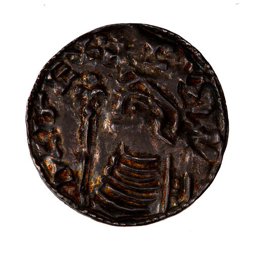 Coin, round, a diademed bust facing left with sceptre with lis head; text around.