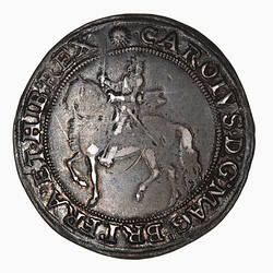 Coin, round, within a circle of beads, the crowned King wearing armour and long scarf on horseback.