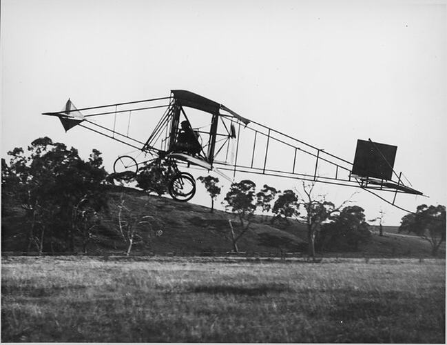 Negative - John Duigan & his Biplane in Flight, Mia Mia, Victoria, circa 1910
