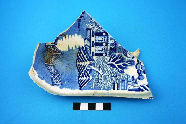 Piece of base of earthenware serving dish.