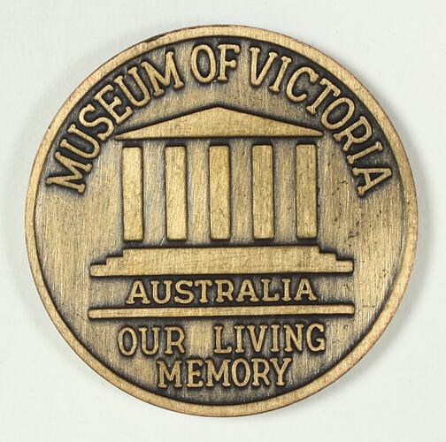 Bronze medal with museum building design.