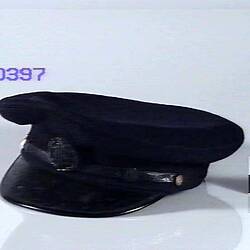 Black uniform cap.