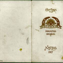 Open card showing rising sun motif.