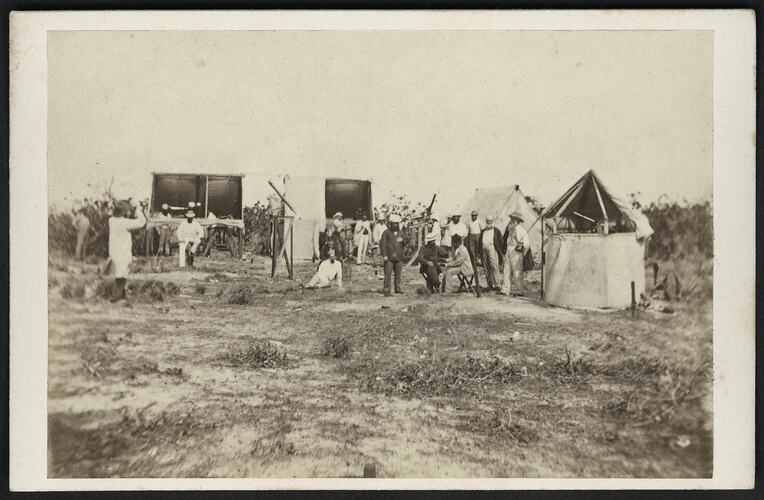 Men with telescopes and tents.