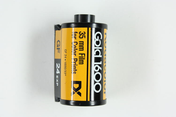 Cylindrical cartridge with printed metal label.