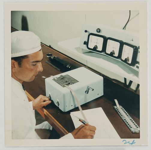Worker Inspecting Film, Kodak Factory, Coburg, circa 1960s