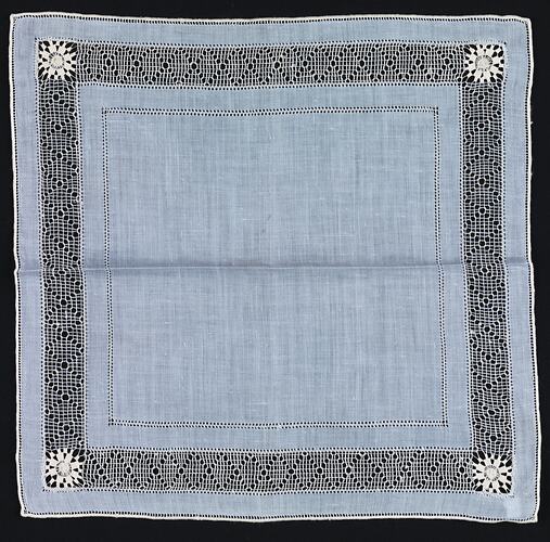Unfolded blue handkerchief with Crocheted Inner Border.