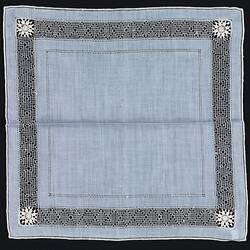 Unfolded blue handkerchief with Crocheted Inner Border.