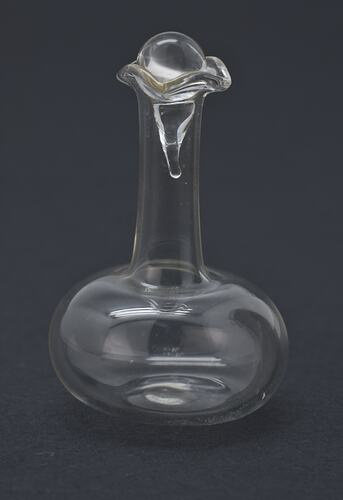 Miniature glass carafe from a doll's house.