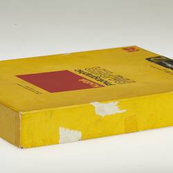 Side view of rectangular yellow box with Kodak logo.