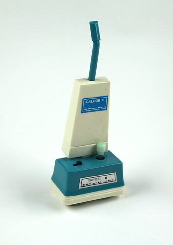 Toy vacuum cleaner, blue and white.