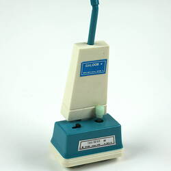 Toy vacuum cleaner, blue and white.