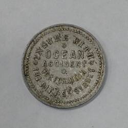 Round ferry transport token.