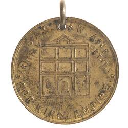 Medal with three square up and across building, text around.