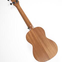 Back of light brown ukulele.