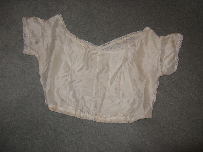 Fine cream silk camisole, short sleeves with lace edging sleeves and wide neckline.