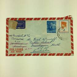 Addressed envelope with blue, white and red trim.