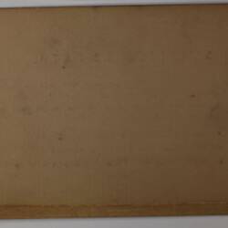 Back of off-white rectangular label.