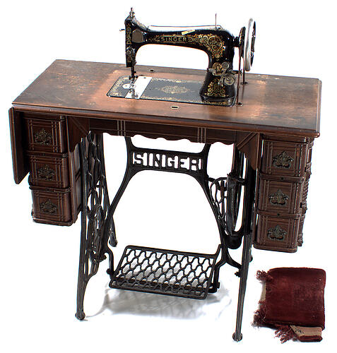 Front of treadle sewing machine.