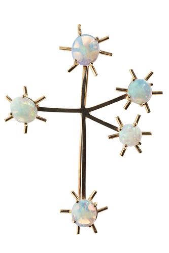 White opal and gold brooch the shape of the southern cross.