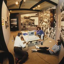 Digital Photograph - Tony Jones reading instructions to Odetta Moore & Caitlin O'Connell, Sunrise School, Melbourne Museum, Russell Street, 1989