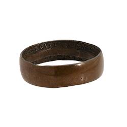 Wedding band made from a penny coin. Inscriptions on inside of band.