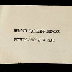 White rectanguar paper sheet with black typewritten text.