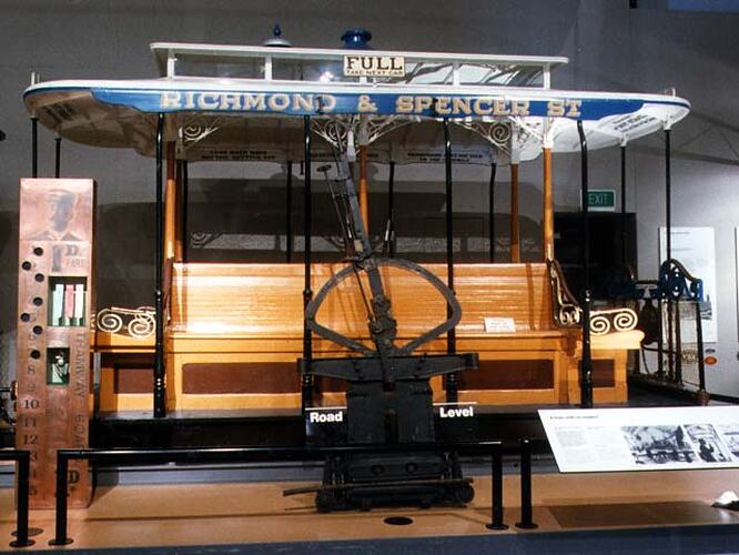 Wooden cable tram with metal gears.