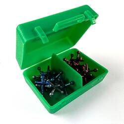 Open green box containing blue and red jacks.
