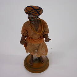 Indian Figure - Man Wearing Orange Bead Necklace, Clay
