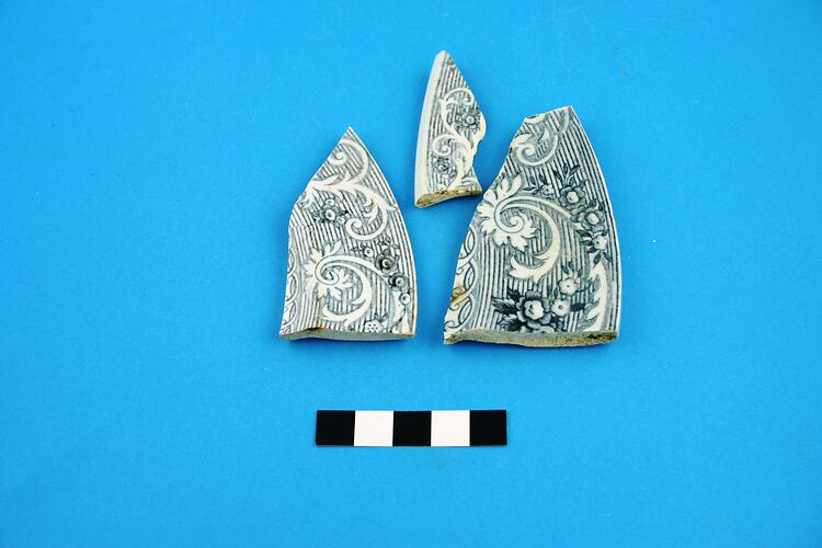 Three earthenware plate rim fragments.