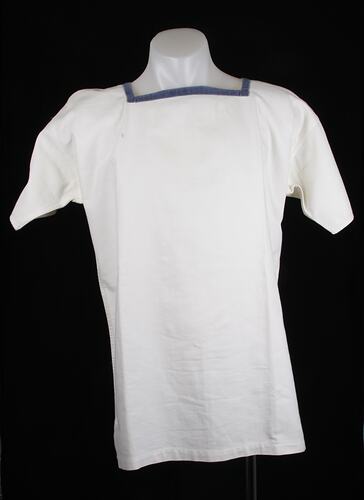 Square-necked white sailor's shirt. Blue edging on neckline.