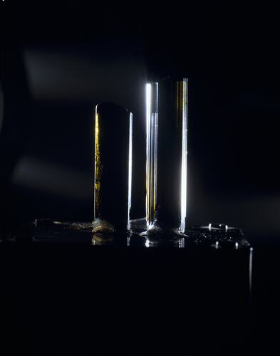 Two rectangular mineral specimens.