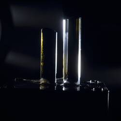 Two rectangular mineral specimens.