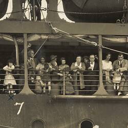 Passengers on deck of ship.