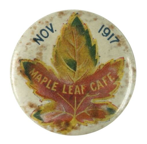 Badge with leaf and text.