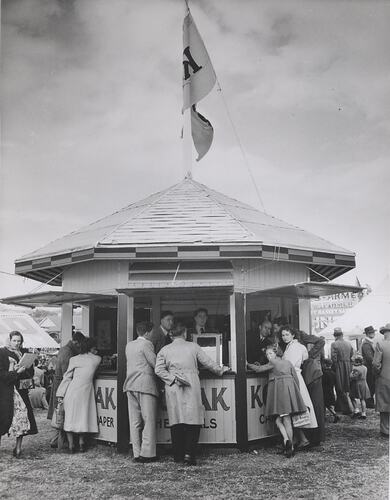 People at outdoor Kodak booth.