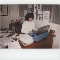 Photograph - Kodak Australasia Pty Ltd, Trish Kilpatrick Typing at Desk, Building 15, Camera, Reels & Sundries, Coburg, early 1980s