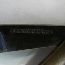 Detail of cut-throat razor showing inscribed name