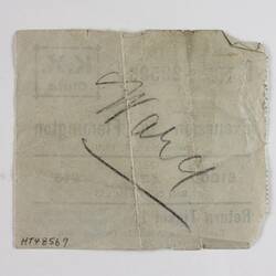 Plain back of ticket with hand-written inscription.