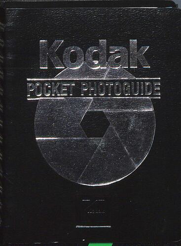 Cover page with black background and silver text. Circular graphic in centre.